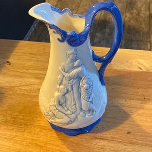 44 year old hand painted ceramic pitcher